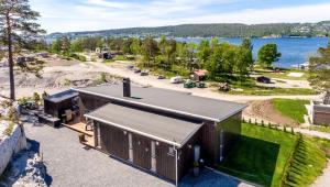 an overhead view of a house with a view of the water at Modern cabin with panoramic views in Porsgrunn