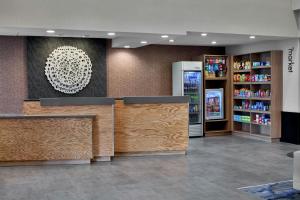 a store lobby with a cash register and a refrigerator at Fairfield by Marriott Inn & Suites LaGrange in La Grange +35 photos