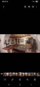 a picture of a room with a desk and a keyboard at Kuća za zabavu ili odmor-Pegas in Orehovica