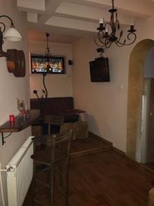 Un televizor și/sau centru de divertisment la Apartman