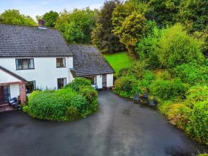 an aerial view of a house with a driveway at Bridlecott Monksilver in Monksilver +20 photos