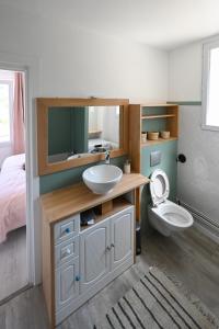 a bathroom with a sink and a toilet at La Belle Droite in Le Havre +96 photos
