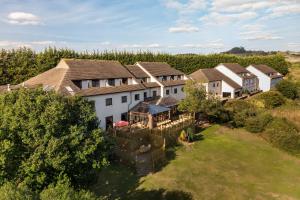 an aerial view of a house in a vineyard at Tor in Newton Abbot
