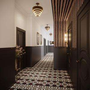 a corridor of a hallway with a corridorngthngthngthngth at The Faust Hotel in New Braunfels