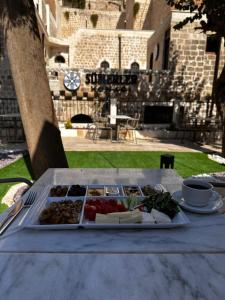 a tray of food sitting on a table at Sümerler Konağı in Mardin