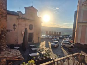 a group of cars parked in a parking lot at Dimora del Funaro con parcheggio in Orvieto
