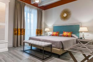 מיטה או מיטות בחדר ב-Hotel San Michele