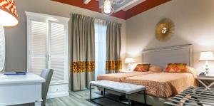 Posteľ alebo postele v izbe v ubytovaní Hotel San Michele