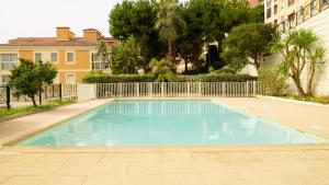 a swimming pool in the middle of a building at Casa Bellevue in Beausoleil +10 photos