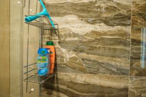a metal rack with a toothbrush and a wall at Studio DORA SS in Stari Banovci +31 photos