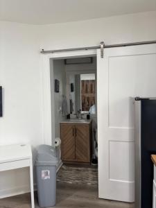 an open door to a kitchen with a sink at dary hause in Indianapolis +31 photos