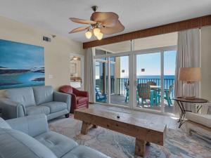 a living room with a couch and a table at Jade East Towers 0640 by Newman-Dailey in Destin
