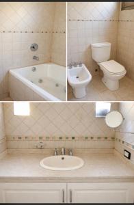 a bathroom with a tub and a toilet and a sink at Suite Republica del Tango Gonnet in Joaquín Gorina
