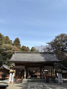 a building with signs in front of it at 杜の酵素808 in Takaharu