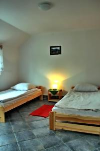 Postel nebo postele na pokoji v ubytování Camping Pod Krokwią