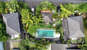 an aerial view of a resort with a swimming pool at Fraser Baye Villas in Uluwatu