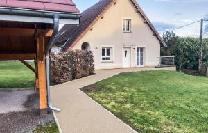 a house with a walkway in front of it at 3 Bedroom Amazing Home In Mutigney in Mutigney