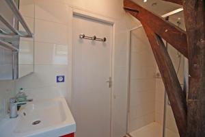 a bathroom with a shower and a sink at Mazeau nicot in Nedde +24 photos