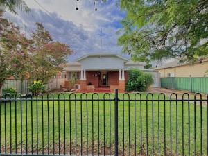 a fence in front of a house at 72 Cobra Street House in Dubbo