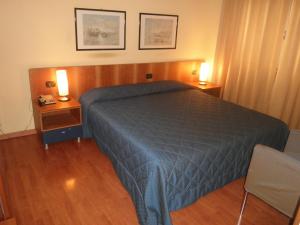 Postel nebo postele na pokoji v ubytování Hotel Selide