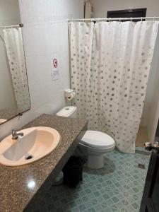 a bathroom with a sink and a toilet and a shower at Istanbul Boutique Hotel in Patong Beach +51 photos