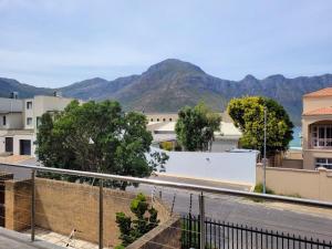 a view of a city with mountains in the background at Leehaven in Hout Bay