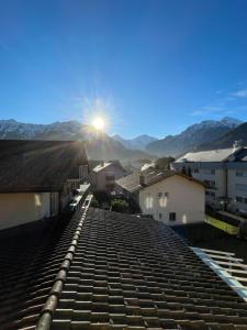 a view from the roof of a house at Gemütliche 3,5 Zimmer Wohnung in Unterseen