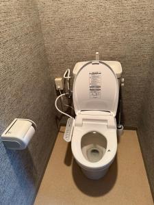 a bathroom with a toilet in a stall at 亀井町Stay201 in Takamatsu