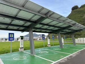 a parking lot with a green floor with a roof at R2R - Pisuco Salvé Experiencia Única con Audioguía Privada en Laredo - C28A01 in Laredo
