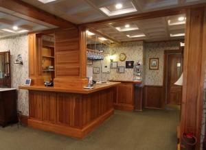 a large room with a large wooden counter in a room at Harbourview Inn in Smiths Cove