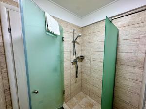 a shower with a glass door in a bathroom at Senin Vama Veche in Vama Veche +6 photos