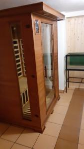 a medicine cabinet with mirrors in a room at Bibina in Levoča +34 photos