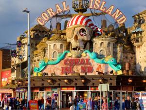 a sign on the front of a carnival building at Kenley Hotel in Blackpool