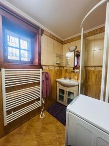 a bathroom with a shower and a sink at Zruby Liptovský Ján in Liptovský Ján +33 photos