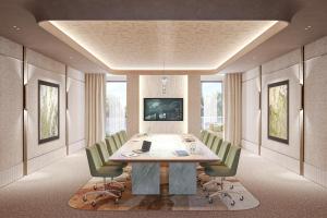 a conference room with a long table and chairs at Icona's Costa Ragusa Resort - New Opening in Scoglitti