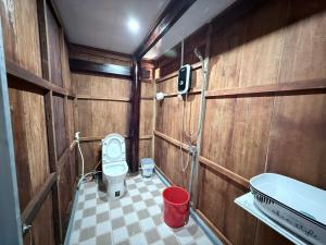 a small bathroom with a toilet and a shower at Bà Đen Garden - Hương Sen Quán in Tây Ninh +97 photos