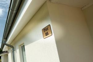 a sign that reads fire on the side of a building at Ferienhaus Pier 85 in Nordhorn