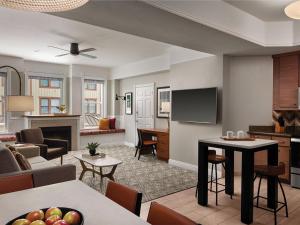 a living room with a couch and a table at Marriott Summit Watch 1BD in Park City