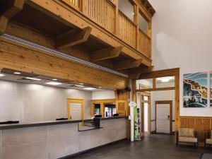 a large lobby with a staircase in a building at Marriott Summit Watch 1BD in Park City