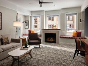 a living room with a couch and a fireplace at Marriott Summit Watch 1BD in Park City