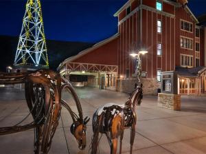 a statue of a horse in front of a building at Marriott Summit Watch 1BD in Park City