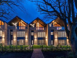 an exterior view of a building at night at 4 Bed in Morpeth oc-95889 in Amble