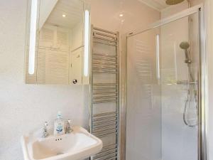 a bathroom with a sink and a shower at 2 Bed in Skipton oc-87370 in Kettlewell +7 photos