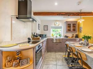 a kitchen with a large island with a counter top at 3 Bed in Nr Masham oc-g0149 in Healey