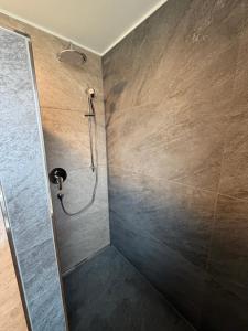 a bathroom with a shower with a shower head at Ferienwohnung in Amstetten in Amstetten