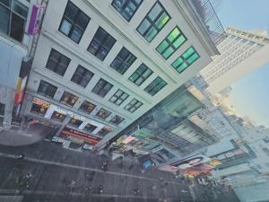 a view from a window of a building at Ekonomy Hotel Myeongdong Premier in Seoul