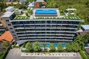 an aerial view of a hotel with a swimming pool at Condo Vireo Pool View Rawai in Phuket