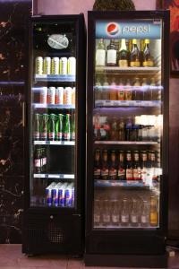 an open refrigerator filled with lots of drinks at Hotel Kotva in Bratislava