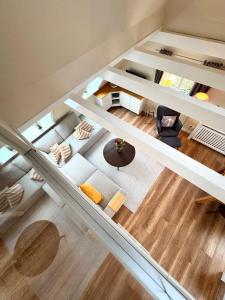 an overhead view of a living room from above at Deichhof Whg 26 in Dunsum +14 photos
