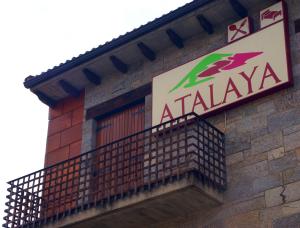aania sign on the side of a brick building at hotel rural ATALAYA in Alcañices